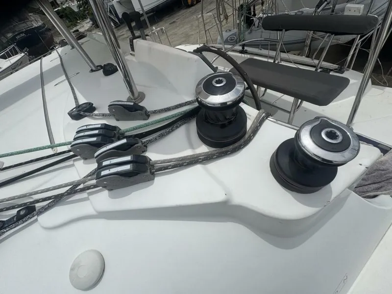 Slide: The Image of 2013 Lagoon 380 S2 - Owner Version This boat is the popular S2, 3 cabin owners' version. The cockpit is protected by a fiberglass hard top with sliding panel over the helm position to allow the skipper excellent visibility of the boat. The boat has new antifoul paint (May 2023), new zincs, - 4791919