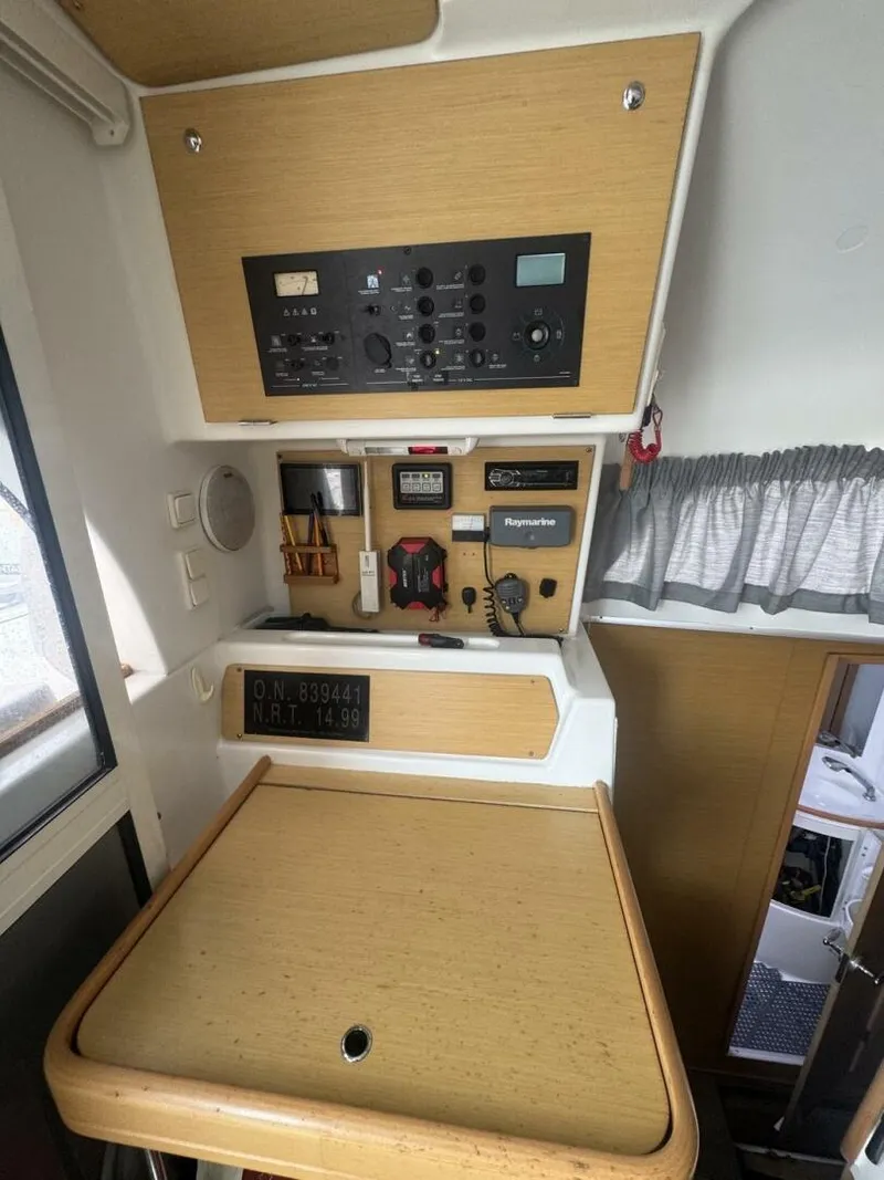 Slide: The Image of 2013 Lagoon 380 S2 - Owner Version This boat is the popular S2, 3 cabin owners' version. The cockpit is protected by a fiberglass hard top with sliding panel over the helm position to allow the skipper excellent visibility of the boat. The boat has new antifoul paint (May 2023), new zincs, - 4791975