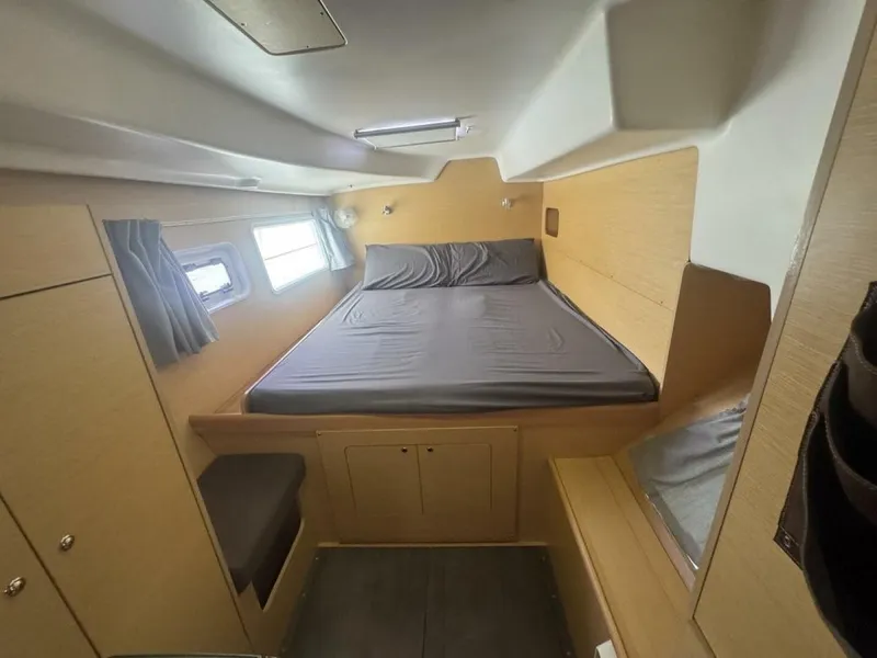 Slide: The Image of 2013 Lagoon 380 S2 - Owner Version This boat is the popular S2, 3 cabin owners' version. The cockpit is protected by a fiberglass hard top with sliding panel over the helm position to allow the skipper excellent visibility of the boat. The boat has new antifoul paint (May 2023), new zincs, - 4791921