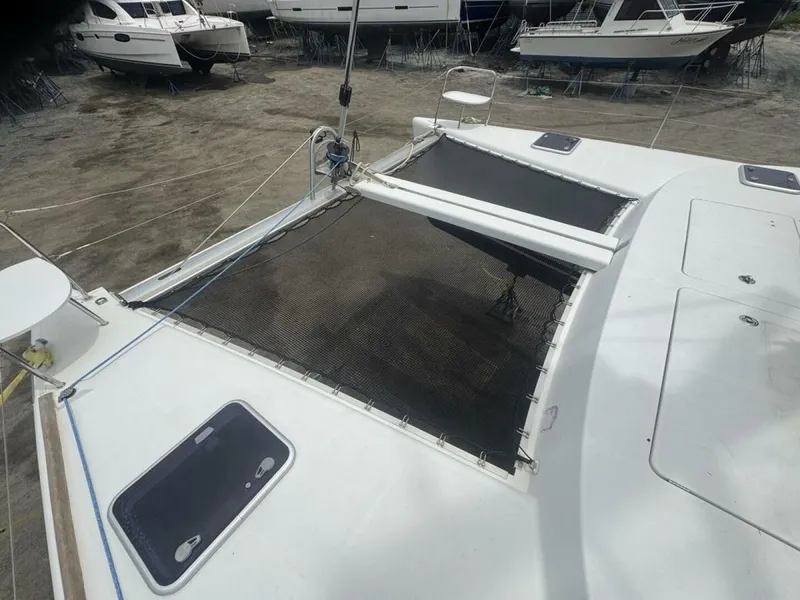 Slide: The Image of 2013 Lagoon 380 S2 - Owner Version This boat is the popular S2, 3 cabin owners' version. The cockpit is protected by a fiberglass hard top with sliding panel over the helm position to allow the skipper excellent visibility of the boat. The boat has new antifoul paint (May 2023), new zincs, - 4791917