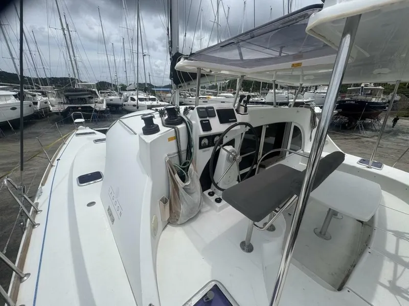 Slide: The Image of 2013 Lagoon 380 S2 - Owner Version This boat is the popular S2, 3 cabin owners' version. The cockpit is protected by a fiberglass hard top with sliding panel over the helm position to allow the skipper excellent visibility of the boat. The boat has new antifoul paint (May 2023), new zincs, - 4791915