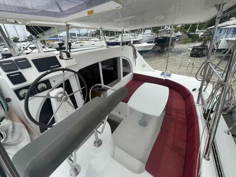 Slide: The Image of 2013 Lagoon 380 S2 - Owner Version This boat is the popular S2, 3 cabin owners' version. The cockpit is protected by a fiberglass hard top with sliding panel over the helm position to allow the skipper excellent visibility of the boat. The boat has new antifoul paint (May 2023), new zincs, - 4791935