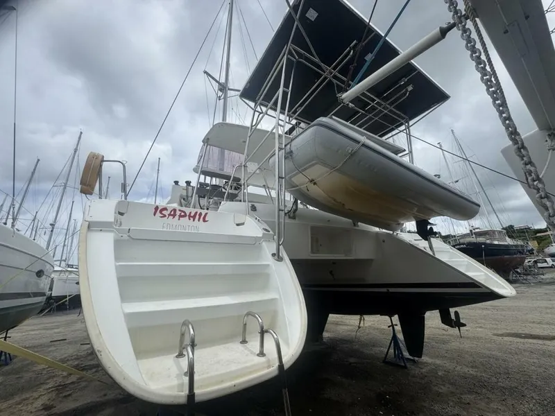 Slide: The Image of 2013 Lagoon 380 S2 - Owner Version This boat is the popular S2, 3 cabin owners' version. The cockpit is protected by a fiberglass hard top with sliding panel over the helm position to allow the skipper excellent visibility of the boat. The boat has new antifoul paint (May 2023), new zincs, - 4791939