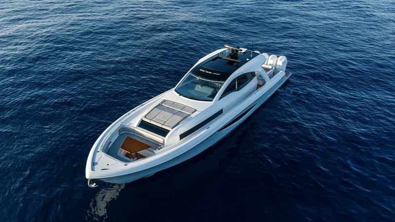 Slide: The Image of Aerial View of Bow and Deck - Valhalla 55 Sport Yacht This aerial shot of the 2027 Valhalla Boatworks 55 SY showcases its sleek bow design and spacious deck layout. The foredeck features integrated sun pads and a comfortable seating area, perfect for relaxation. Its modern, streamlined silhouette cuts gracef - 6332947