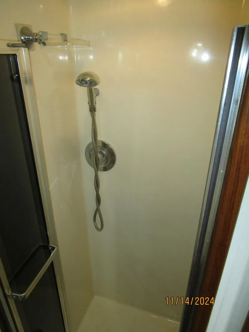 Slide: The Image of 44' Viking master stateroom shower - 4822576
