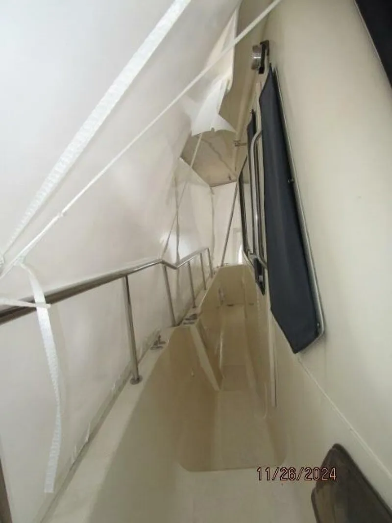 Slide: The Image of 34' Mainship starboard side deck2 - 4856850