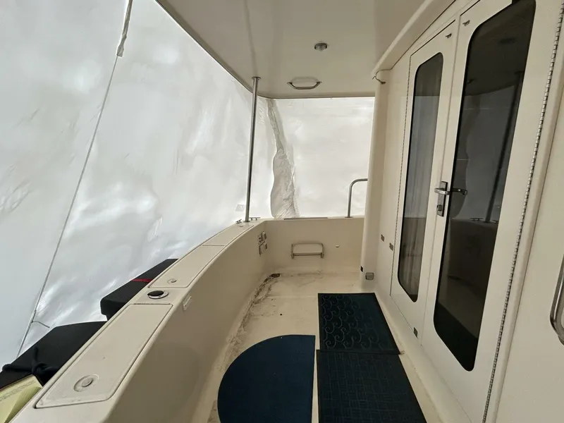 Slide: The Image of 34' Mainship aftdeck port - 4856787