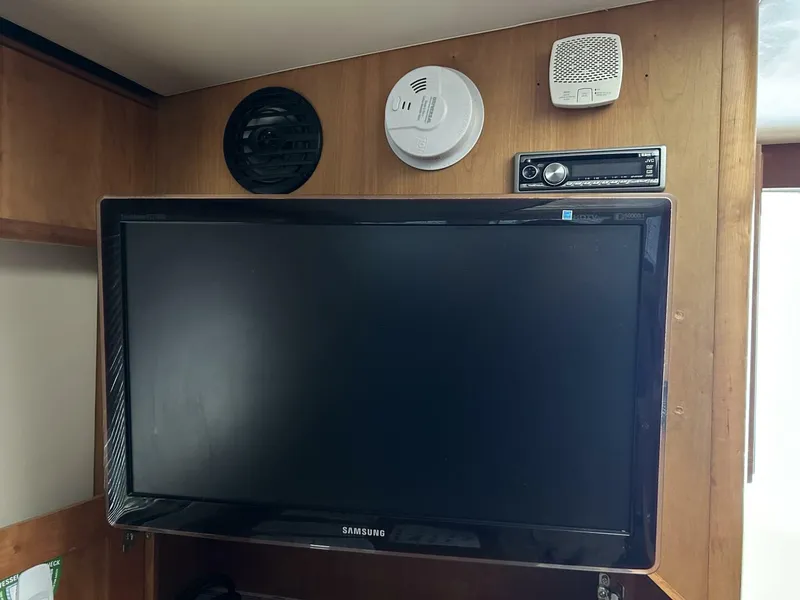 Slide: The Image of 34' Mainship salon TV - 4856842