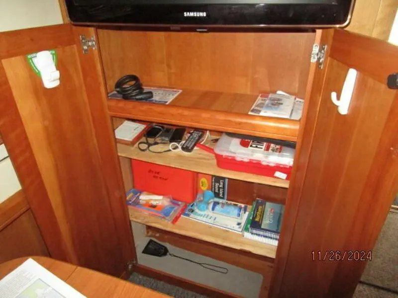 Slide: The Image of 34' Mainship salon storage locker - 4856841