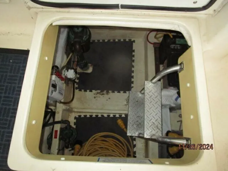 Slide: The Image of 34' Mainship engine room access - 4856801