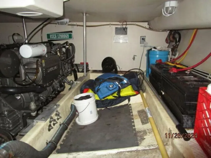 Slide: The Image of 34' Mainship engine room forward - 4856802