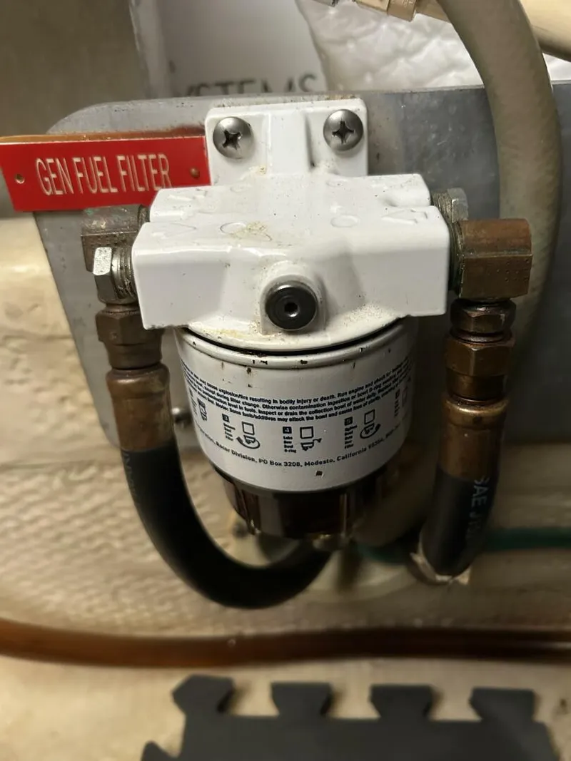 Slide: The Image of 34' Mainship generator Racor fuel filter - 4856809