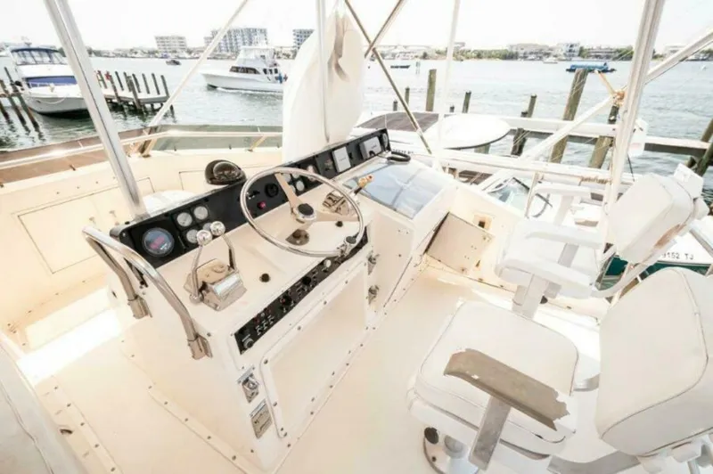 Slide: The Image of 1991 Hatteras 45 Convertible  REEL BROKE Helm - 4855855