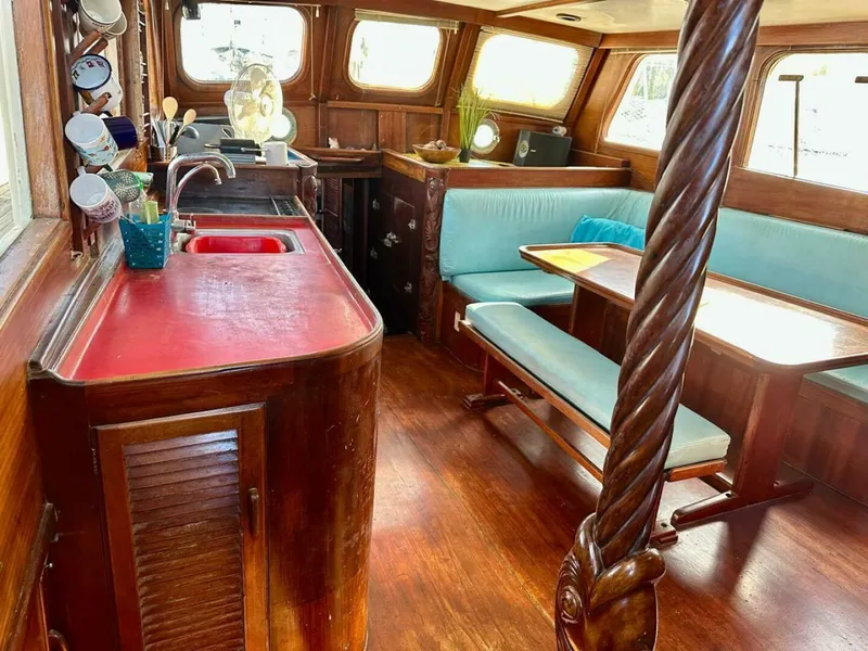 Slide: The Image of 72 ft Custom 1978 Don Brooke Ketch/Motorsailer MONSOON Monsoon is a 1978 large ocean-going cruising ketch that was professionally designed and built and is well equipped for the most demanding of open ocean voyages and has made three Pacific Ocean crossings.  

She carries all furling sails, a 185 horsepower  - 4863270