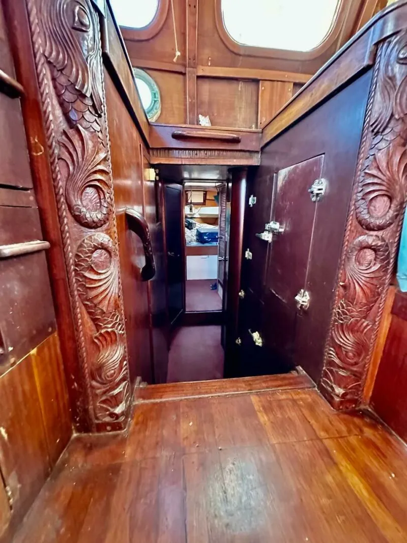 Slide: The Image of 72 ft Custom 1978 Don Brooke Ketch/Motorsailer MONSOON Monsoon is a 1978 large ocean-going cruising ketch that was professionally designed and built and is well equipped for the most demanding of open ocean voyages and has made three Pacific Ocean crossings.  

She carries all furling sails, a 185 horsepower  - 4863277