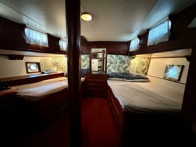 Slide: The Image of 72 ft Custom 1978 Don Brooke Ketch/Motorsailer MONSOON Monsoon is a 1978 large ocean-going cruising ketch that was professionally designed and built and is well equipped for the most demanding of open ocean voyages and has made three Pacific Ocean crossings.  

She carries all furling sails, a 185 horsepower  - 4863276