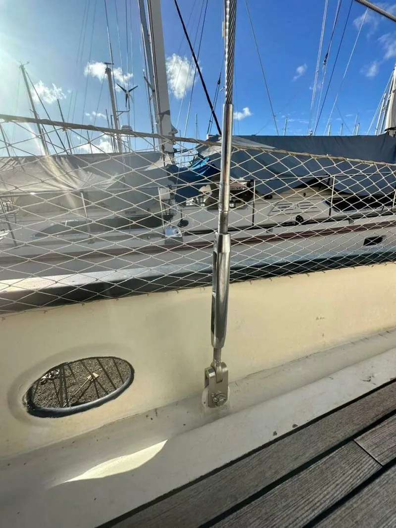 Slide: The Image of 72 ft Custom 1978 Don Brooke Ketch/Motorsailer MONSOON Monsoon is a 1978 large ocean-going cruising ketch that was professionally designed and built and is well equipped for the most demanding of open ocean voyages and has made three Pacific Ocean crossings.  

She carries all furling sails, a 185 horsepower  - 4863263