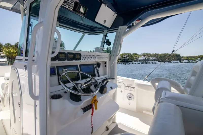 Slide: The Image of 2009 Everglades 35 Center Console Outta Hand - 4867482