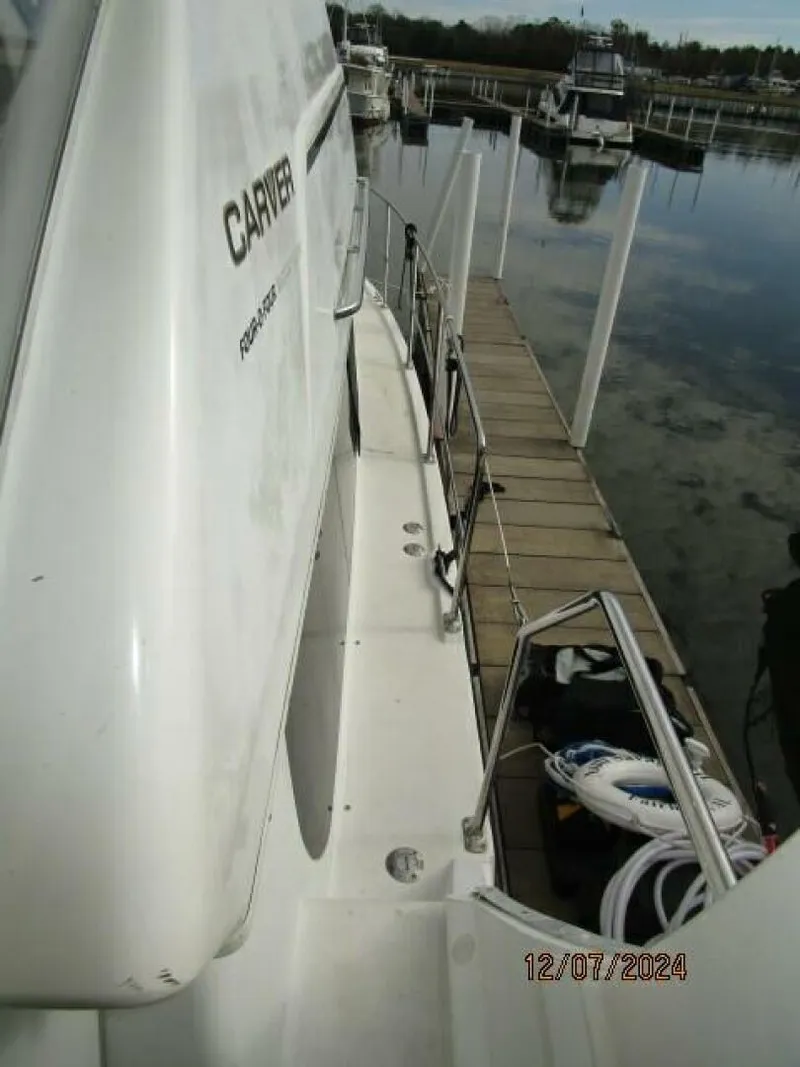 Slide: The Image of 40' Carver starboard side deck2 - 4876738