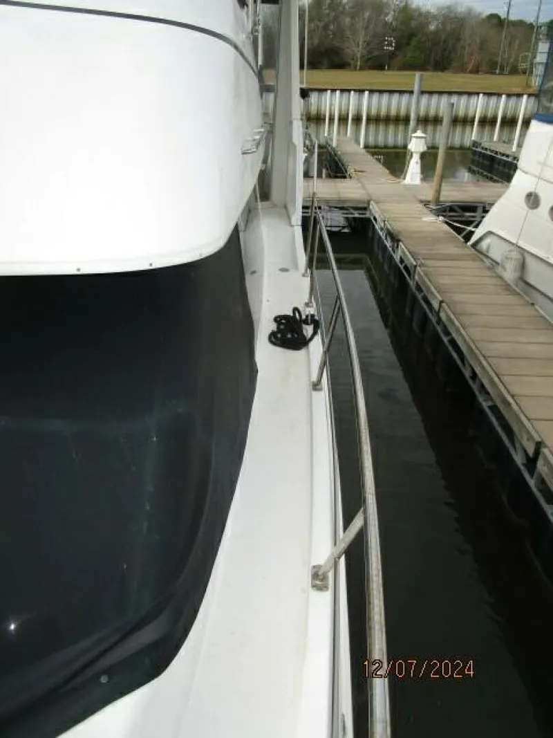 Slide: The Image of 40' Carver port side deck1 - 4876726