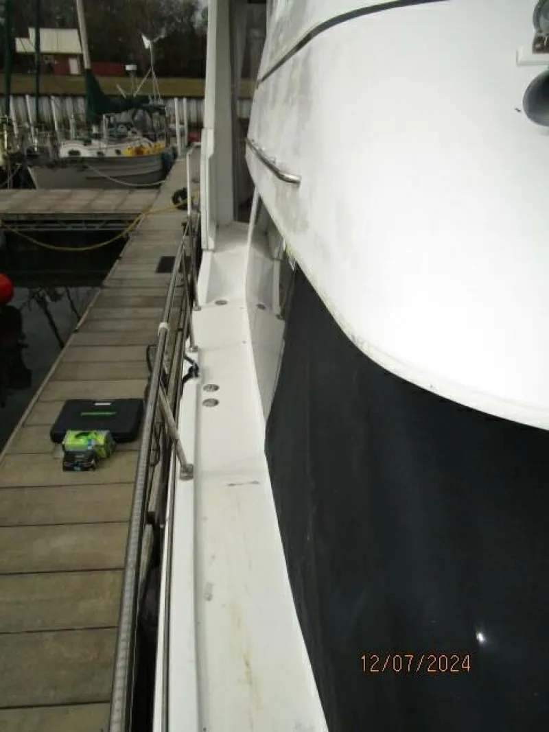 Slide: The Image of 40' Carver starboard side deck1 - 4876739