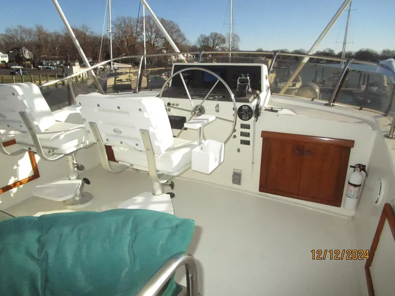 Slide: The Image of 48' Hatteras flybridge forward - 4900457