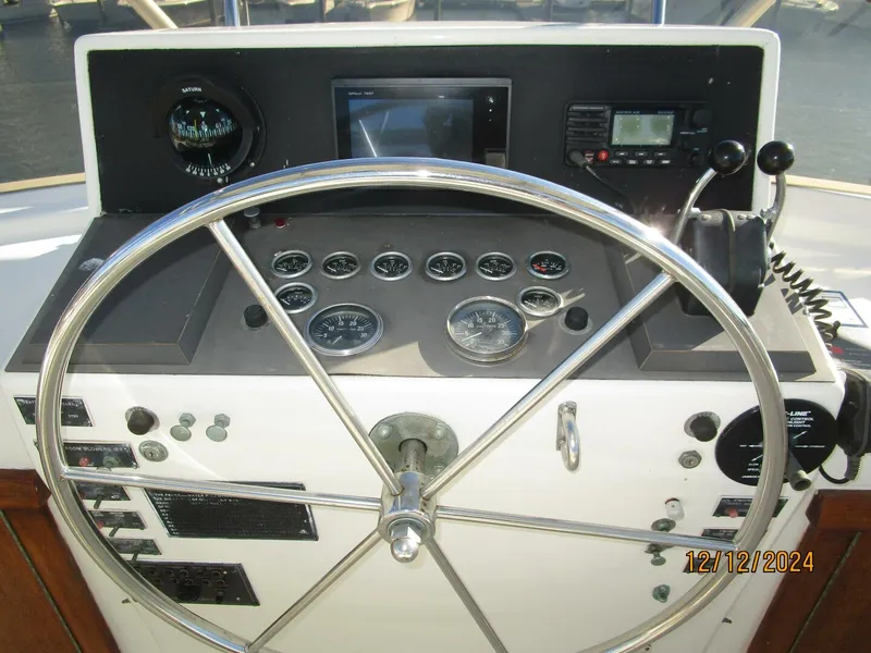 Slide: The Image of 48' Hatteras flybridge helm2 - 4900459