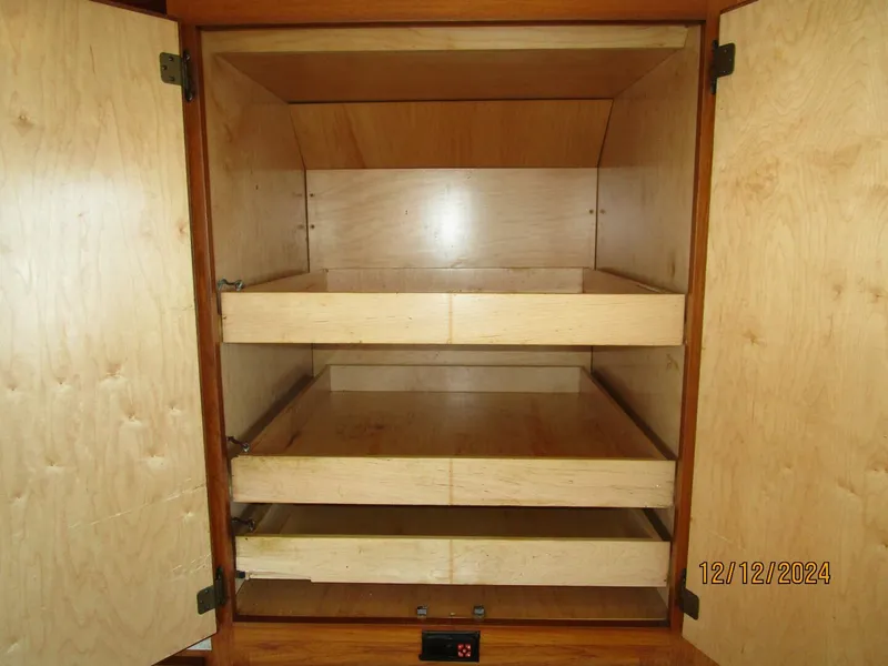 Slide: The Image of 48' Hatteras galley storage - 4900469