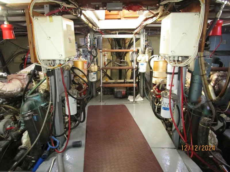 Slide: The Image of 48' Hatteras engine room forward - 4900452