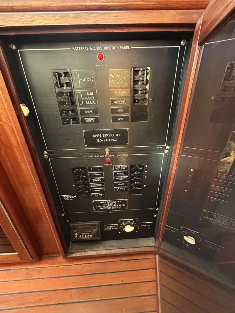 Slide: The Image of 48' Hatteras pilothouse electrical panel2 - 4900493