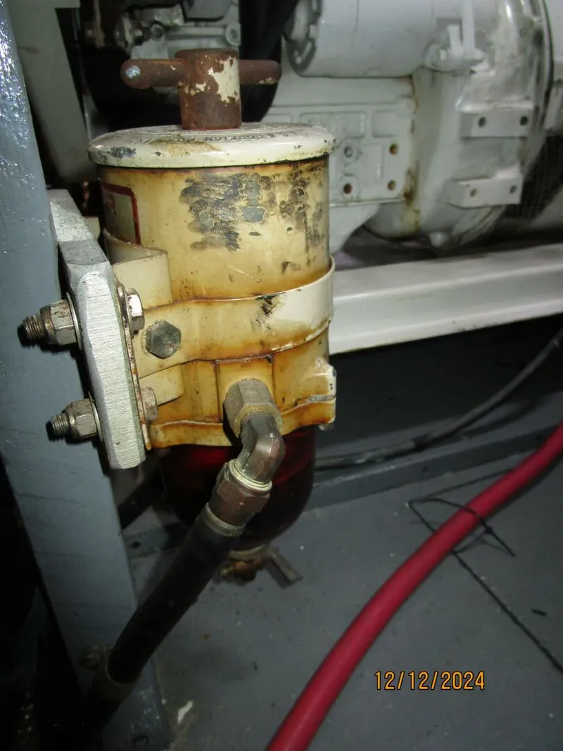 Slide: The Image of 48' Hatteras generator Racor fuel filter - 4900473