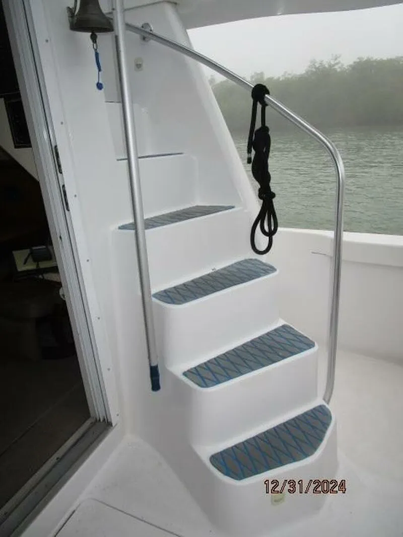 Slide: The Image of 39' Mainship aftdeck-flybridge stairs - 4911690
