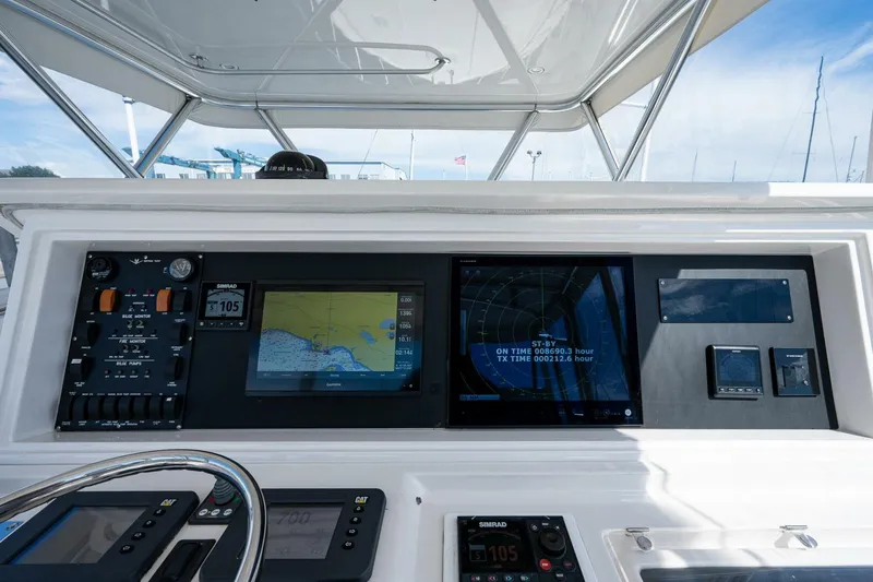 Slide: The Image of Bertram 57 NINE - Flybridge Helm Station Electronics 2008 Bertram 57 570 NINE - 4913113