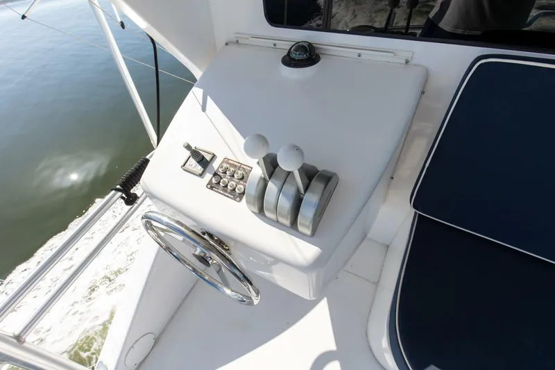 Slide: The Image of 2001 65 Viking Convertible Enclosed Bridge Partnership Outside Lower Helm - 5003905