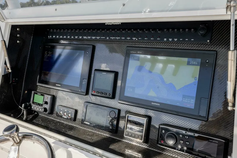 Slide: The Image of SeaHunter 33 Bloodline - Exterior Helm 2018 SeaHunter 33 Center Console Bloodline - 7654436