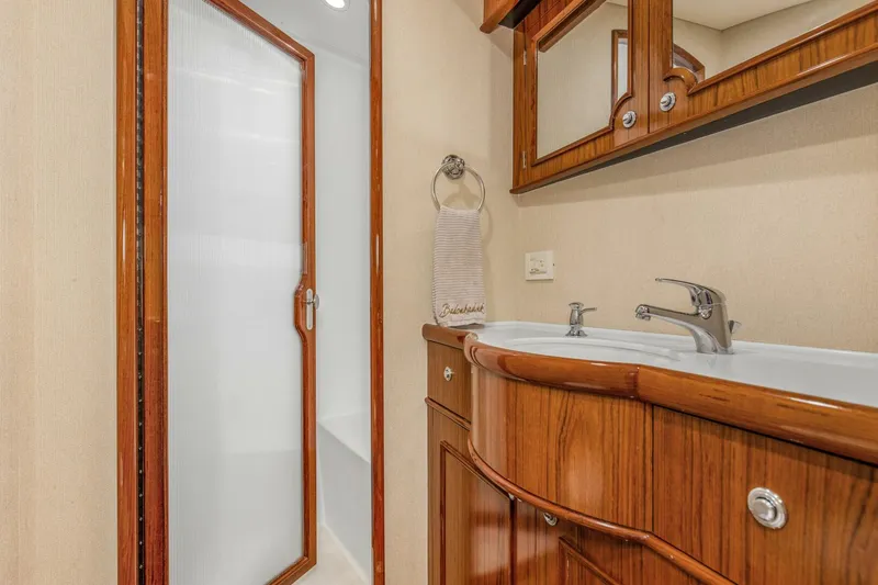 Slide: The Image of 2005 76 Whiticar Enclosed Bridge Badonkadonk Starboard Head - 4982603