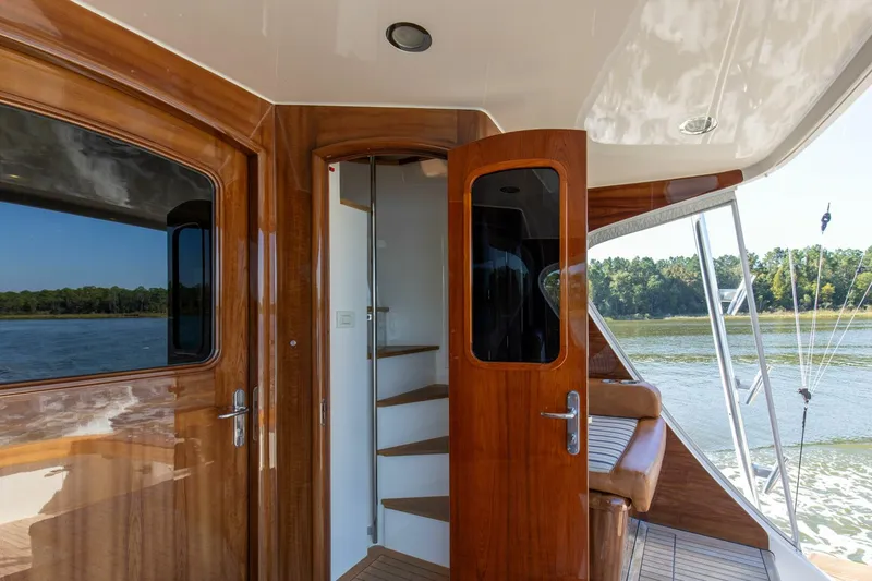 Slide: The Image of 2005 76 Whiticar Enclosed Bridge Badonkadonk Deck Stairs To Bridge - 4982617