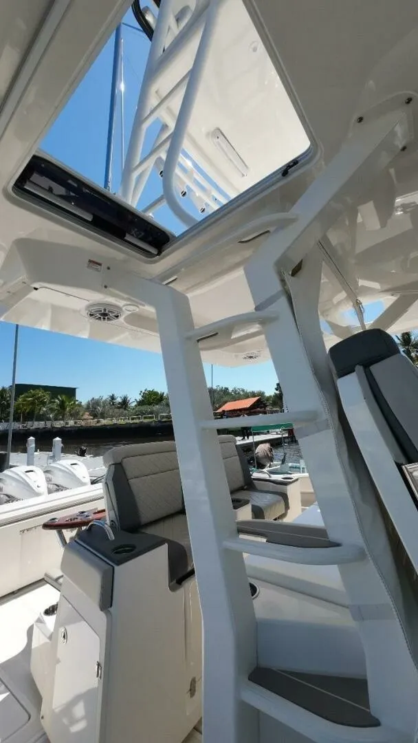 Slide: The Image of Pursuit 42 - Happy Hour - Helm 2022 Pursuit S428 - Happy Hour - 7653688