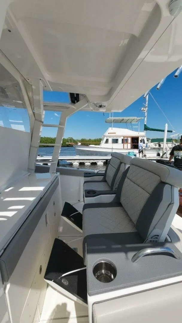 Slide: The Image of Pursuit 42 - Happy Hour - Helm 2022 Pursuit S428 - Happy Hour - 7653692