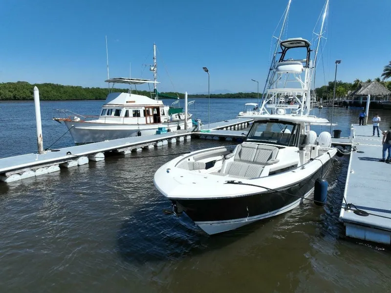 Slide: The Image of Pursuit 42 - Happy Hour - Exterior Profile 2022 Pursuit S428 - Happy Hour - 7653680