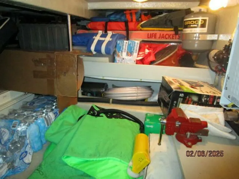 Slide: The Image of 43' Mikelson mid bilge storage area port - 5036887