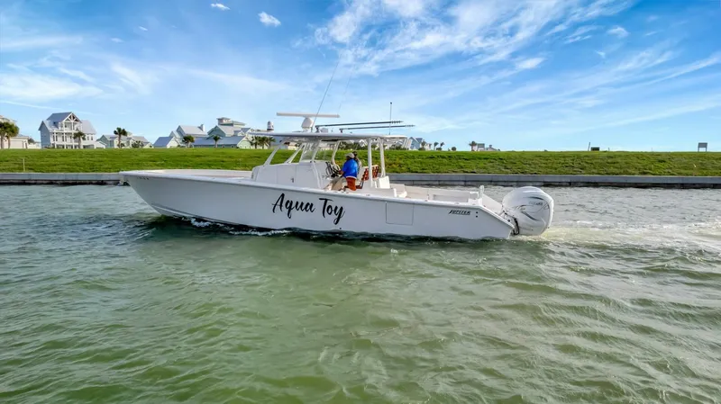 Slide: The Image of 2023 Jupiter 43 Center Console "Aqua Toy" - 5189333