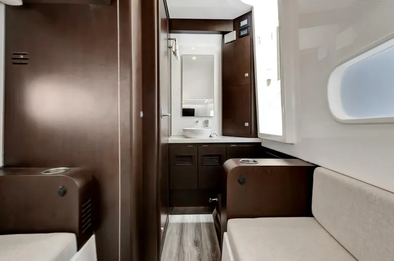 Slide: The Image of 2023 Jupiter 43 Center Console "Aqua Toy" - 5189293