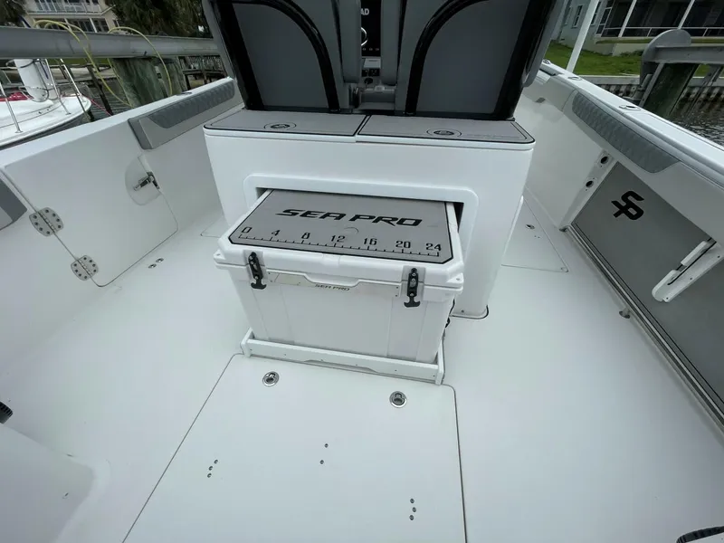 Slide: The Image of Sea Pro 320 DLX 2023- Cockpit Storage  2023 Sea Pro 320 DLX  - 5143349