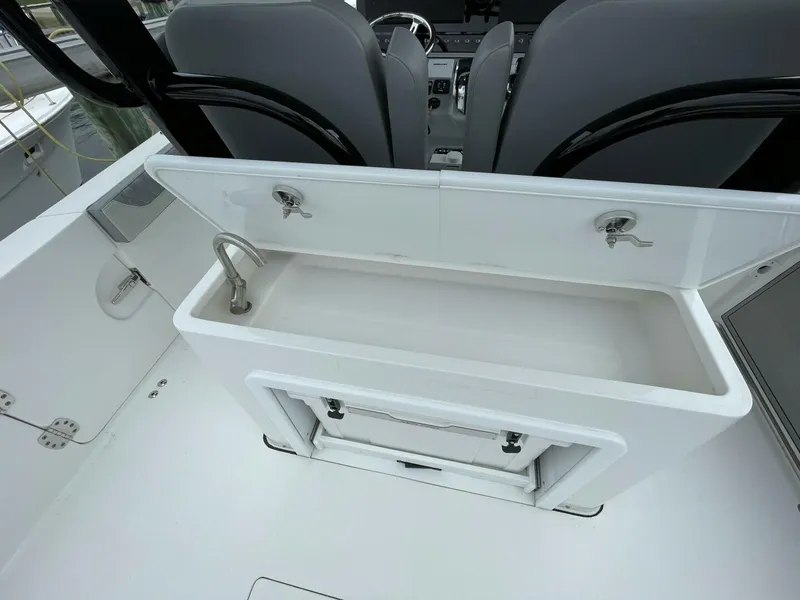 Slide: The Image of Sea Pro 320 DLX 2023- Cockpit Storage  2023 Sea Pro 320 DLX  - 5143350