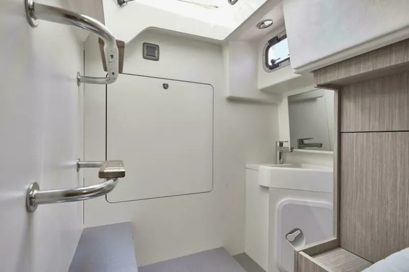 Slide: The Image of 2025 49 Prestige F4 Flybridge - Guest Stateroom/Crew Quarters Head Sistership - 5153915