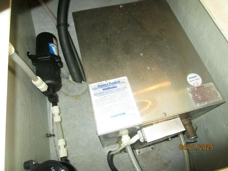 Slide: The Image of 34' Mainship water heater - 5185683