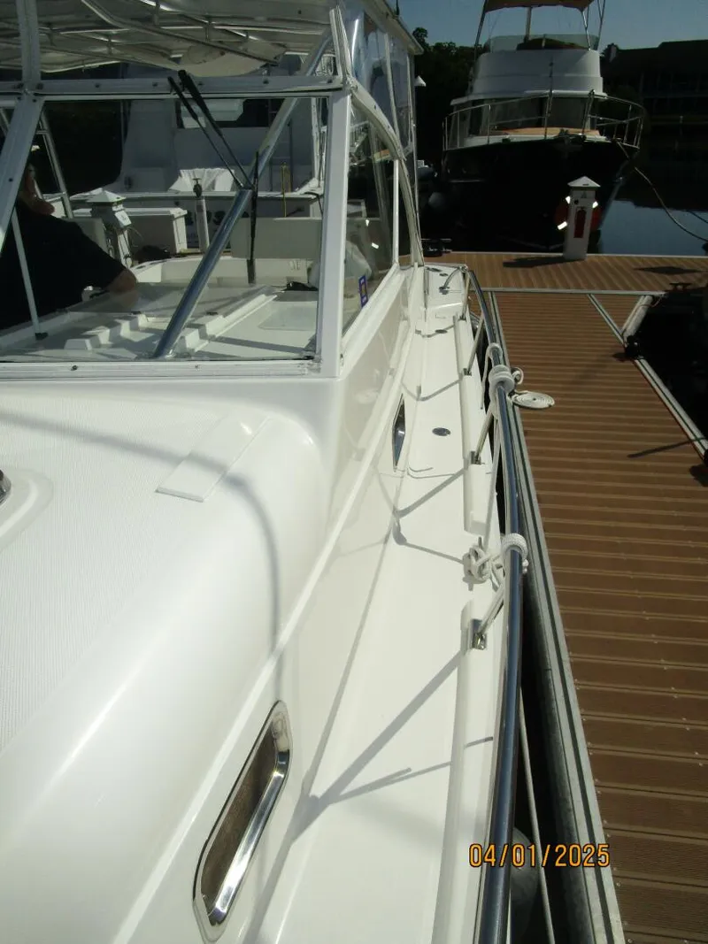 Slide: The Image of 34' Mainship port side deck1 - 5185658