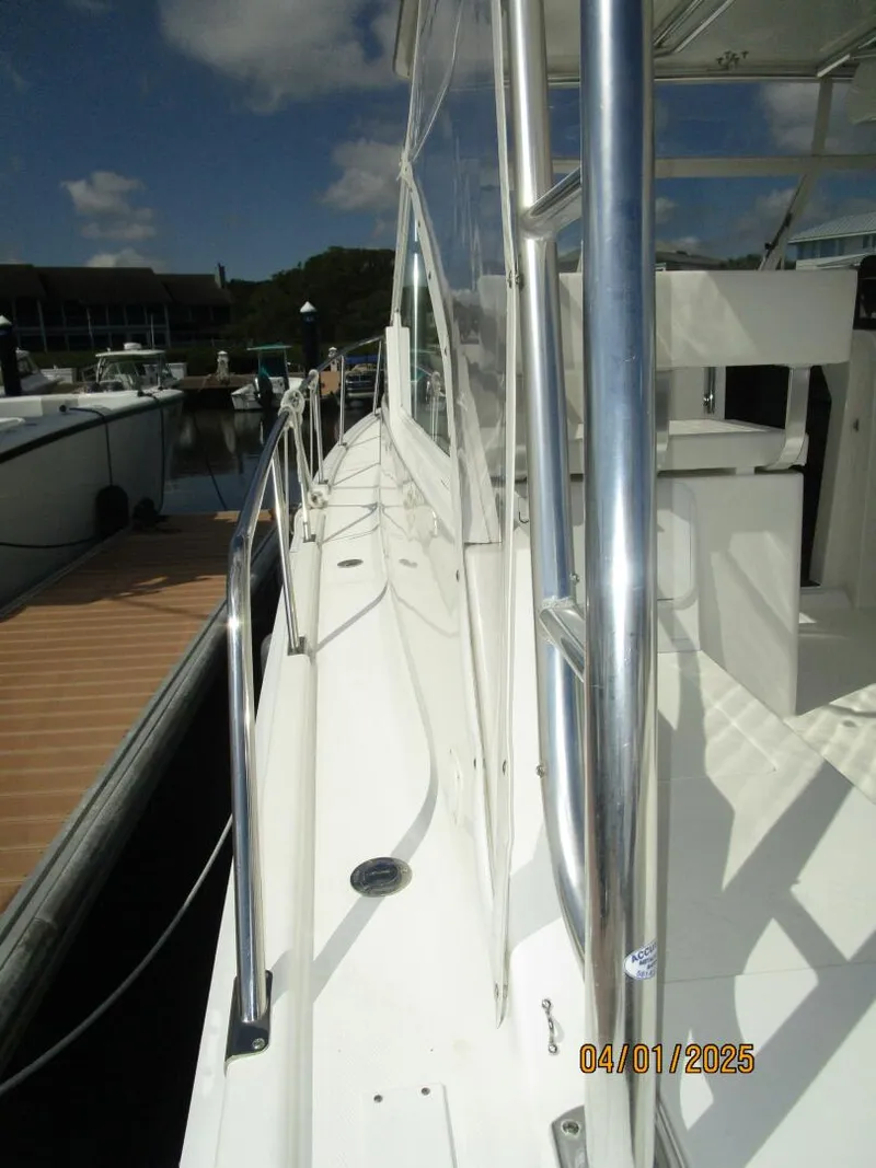 Slide: The Image of 34' Mainship port side deck2 - 5185662