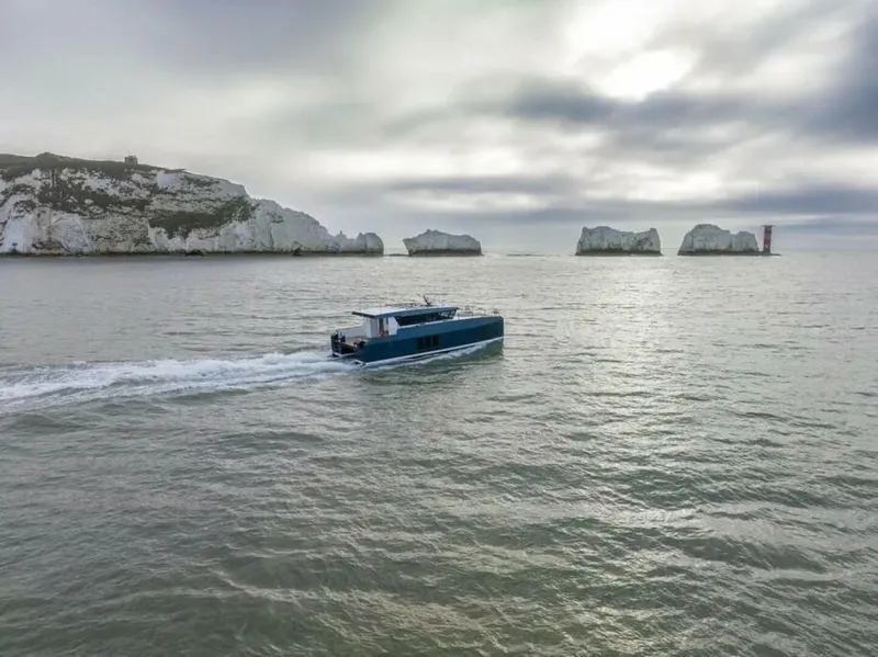 Slide: The Image of Let's set up a date for a video call to build out your Archipelago Yacht and get you accurate pricing. - 5187982